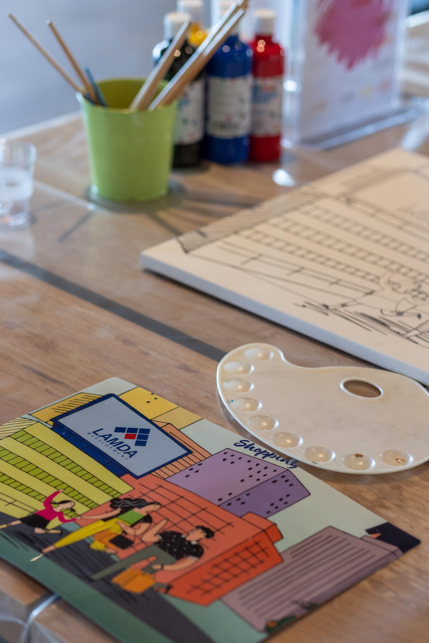 Creative workshop setup with Lamda Development branding during a leadership trip by feelosophy in Costa Navarino.