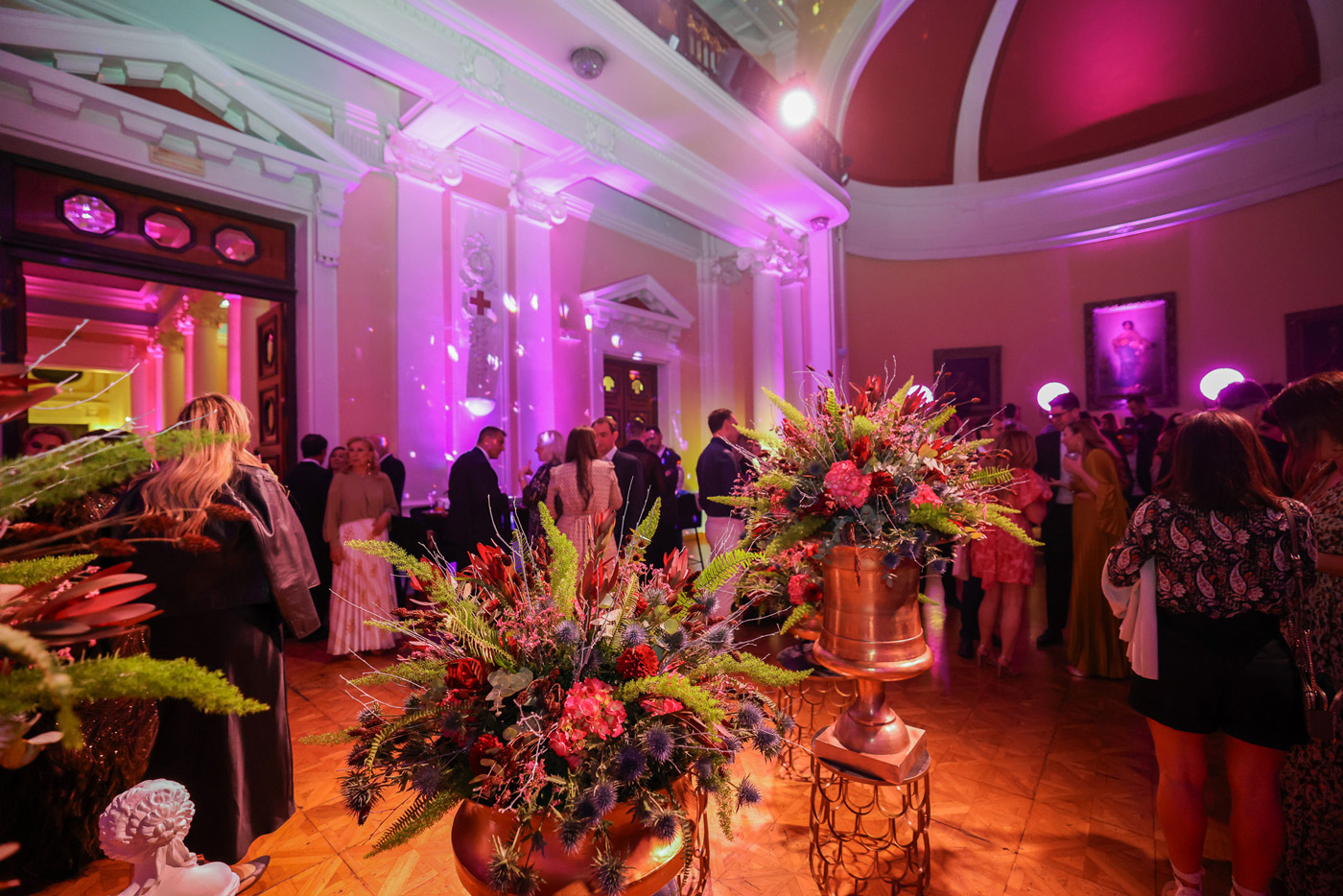 Corporate event in Greece with elegant floral decoration — DMC agency organizing luxury incentive reception in a historic venue.