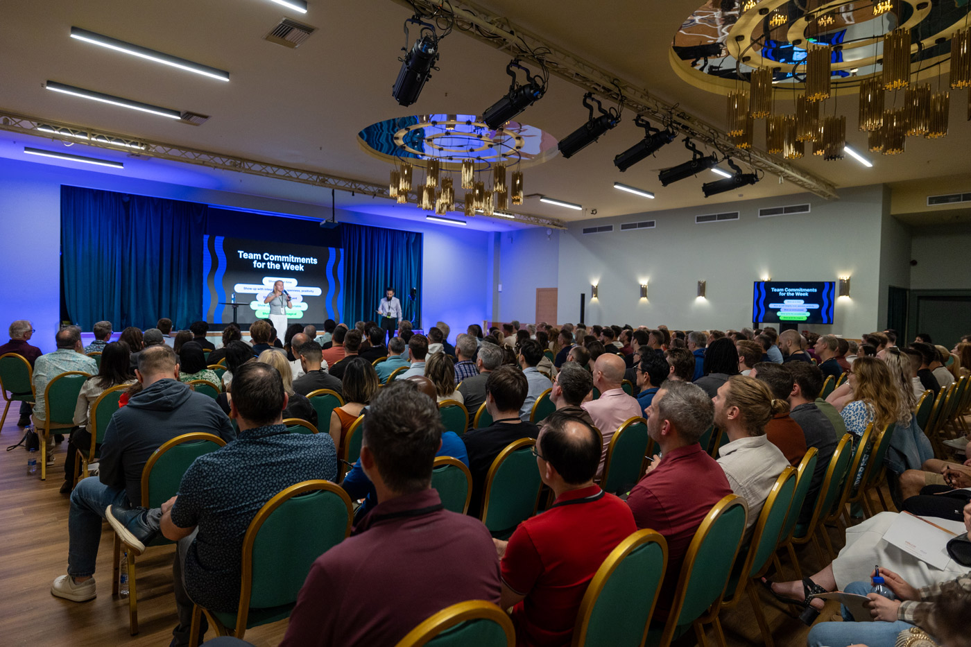 Corporate conference and team building event — keynote speaker addressing participants during a company meeting and training session organized by a DMC agency in Greece.