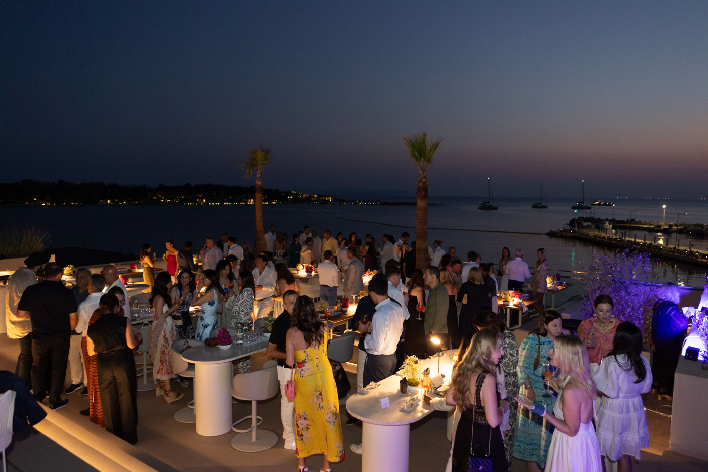 YPO Mayfair farewell event on the Athenian Riviera – evening cocktail and networking by the sea, designed by DMC agency Feelosophy for luxury corporate incentive trips in Greece.