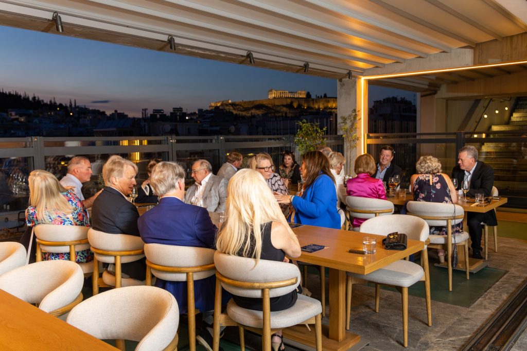 Corporate dinner event in Athens, Greece — DMC agency organizing incentive trip evening with Acropolis view and networking experience.