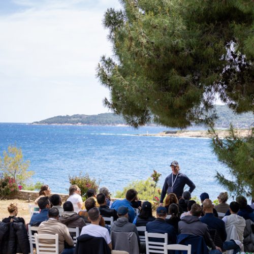Outdoor leadership session by the sea during EO Regional Leadership Academy experiential learning program